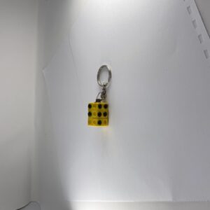 2 llaveros para aprender y practicar Braille